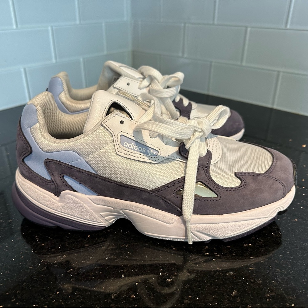Brand new, never worn. Addias, size 9W